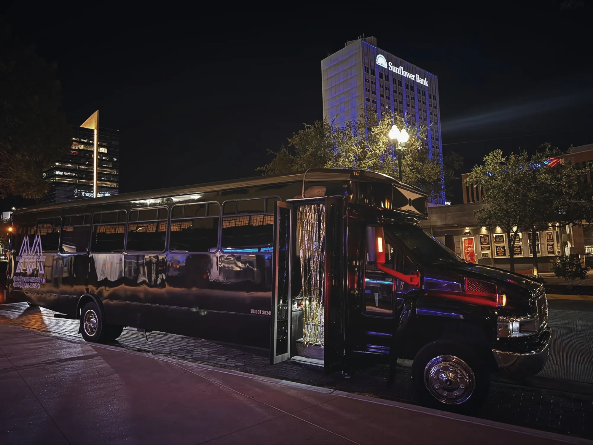 Party bus at night in downtown El Paso