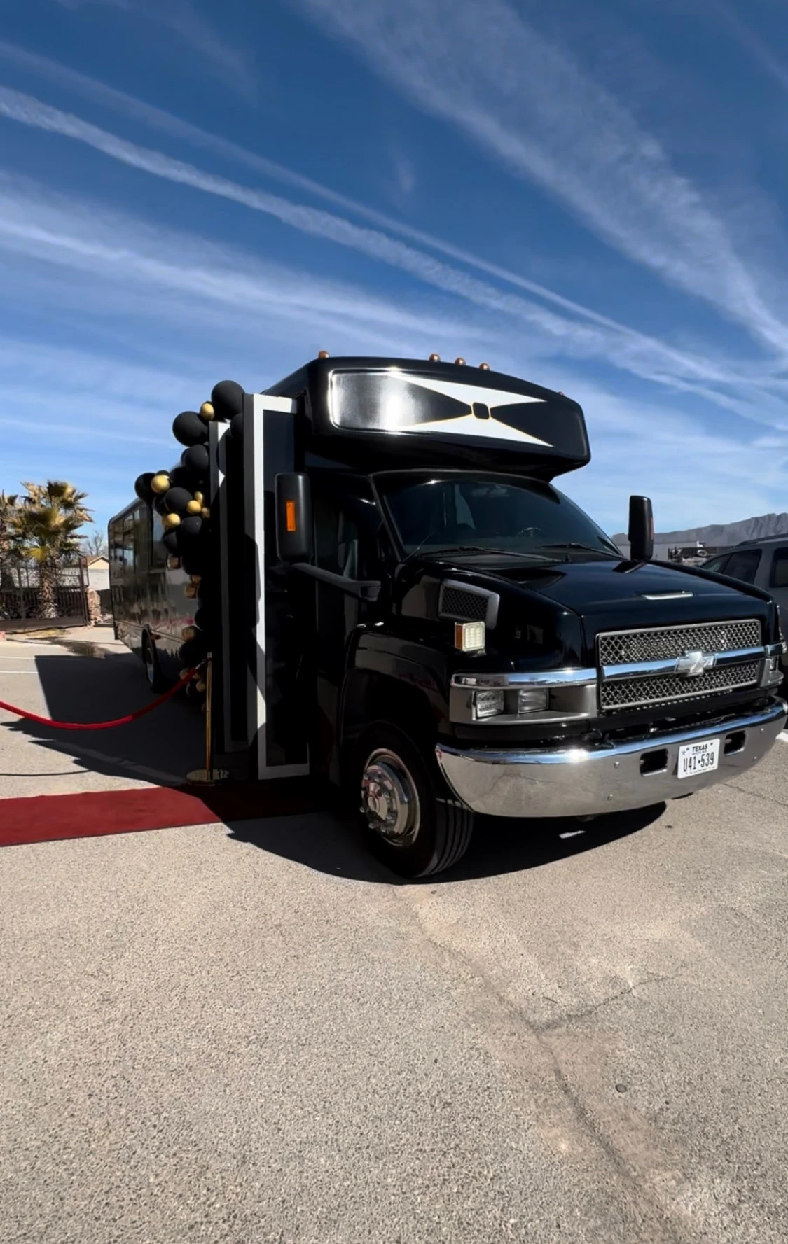 Nine One Five Movement luxury party bus with red carpet entrance