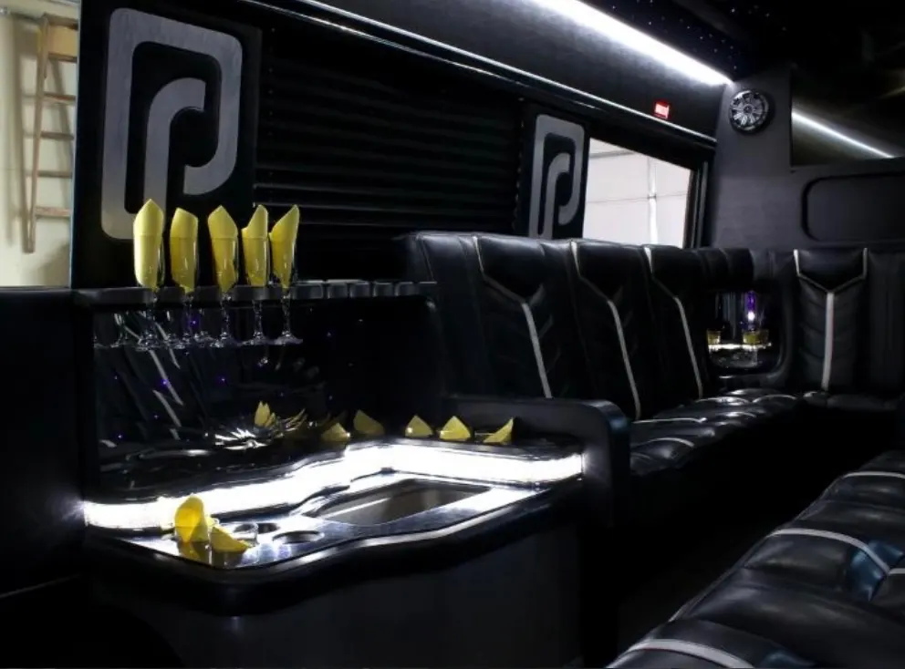 Sprinter bar with champagne flutes and lit countertop